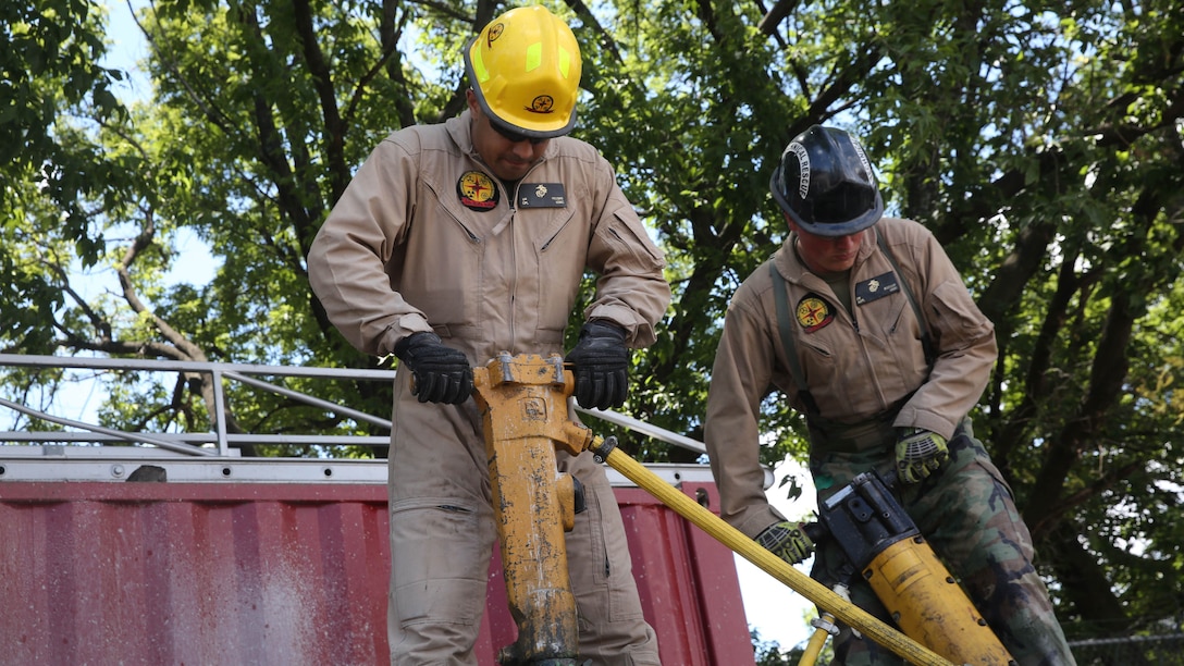 Marines and sailors with Chemical Biological Incident Response Force train alongside the Fire Department of New York for a field training exercise at the F.D.N.Y. training academy in Randall’s Island, N.Y. June 20, 2016. CBIRF is an active duty Marine Corps unit that, when directed, forward-deploys and/or responds with minimal warning to a chemical, biological, radiological, nuclear or high-yield explosive threat or event in order to assist local, state, or federal agencies and the geographic combatant commanders in the conduct of CBRNE response or consequence management operations, providing capabilities for command and control; agent detection and identification; search, rescue, and decontamination; and emergency medical care for contaminated personnel. 