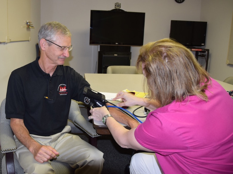 U.S. Army Corps of Engineers, Buffalo District Safety Officer Bill Pioli gets his blood pressure tested by an occupational health safety nurse, June 24, 2016. 