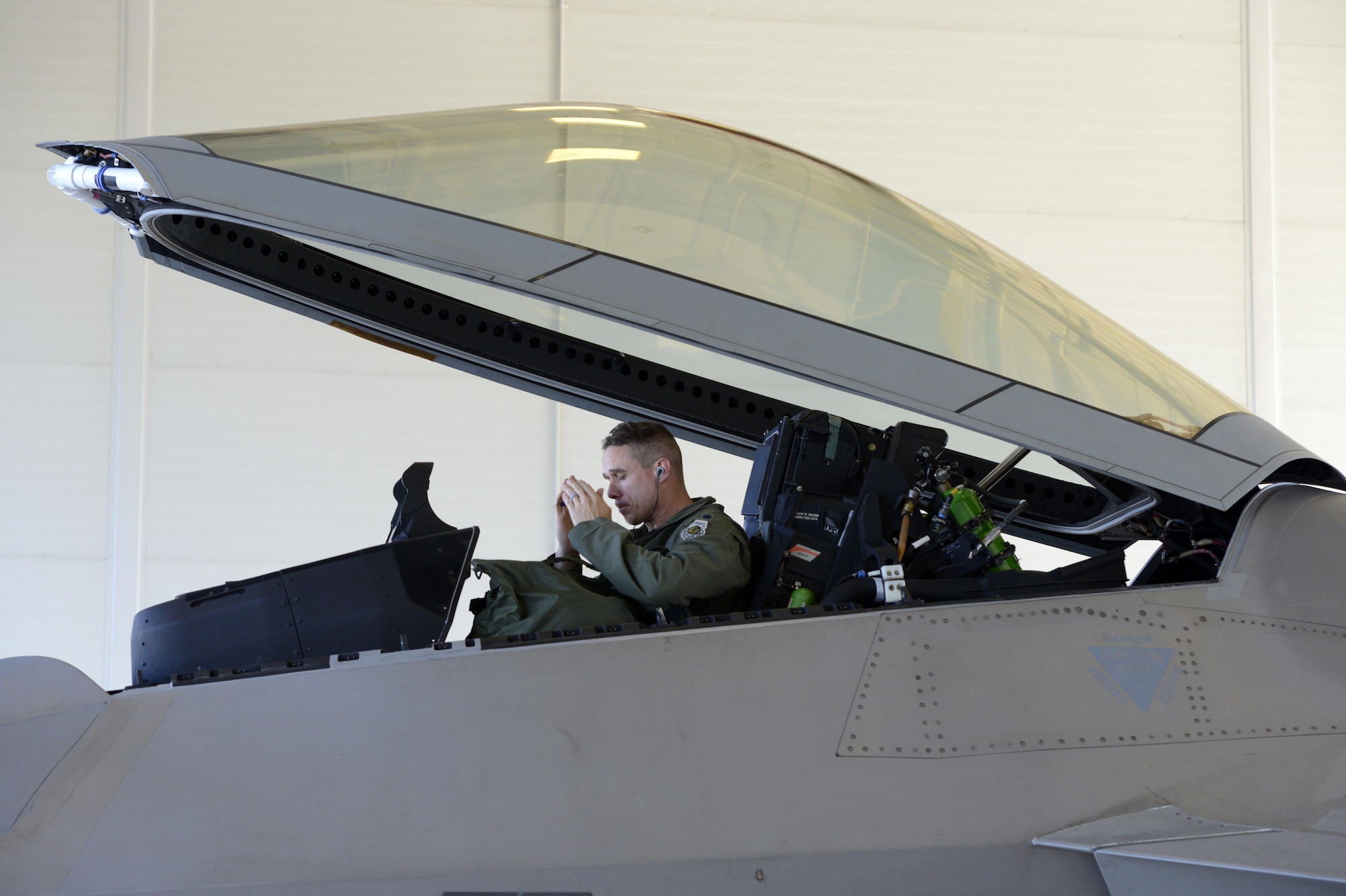 Air Force Lt. Col. Brandon Tellez, 525th Fighter Squadron commander and F-22 Raptor pilot, flew his 1,000th hour in a Raptor at Joint Base Elmendorf-Richardson, June 22, 2016. Tellez is the 23rd Raptor pilot to reach the 1,000-hour milestone. (U.S. Air Force photo by Airman 1st Class Javier Alvarez)