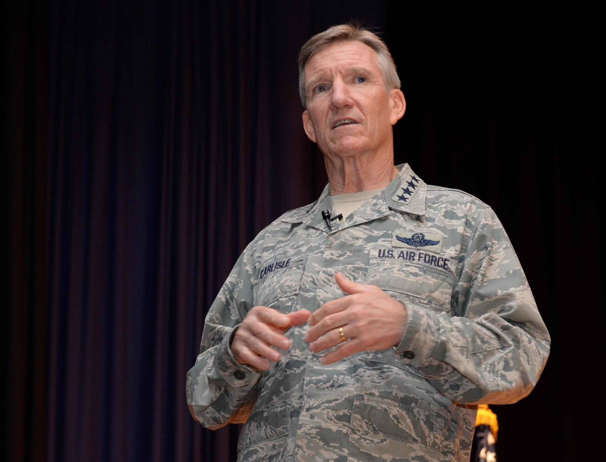 Gen. Hawk Carlisle, commander of Air Combat Command, speaks during an enlisted all-call at Joint Base Langley Eustis, June 28, 2016. Carlisle’s presentation to the enlisted Airmen stationed here included facts about Operation Desert Storm, updates on the status of the Air Force and a question and answer session. At the conclusion of the enlisted call, Carlisle was presented with an invitation to be inducted into the Order of the Sword to recognize his dedication to the enlisted force during his 38 years of service. The Order of the Sword is the highest honor Air Force enlisted Airmen can bestow upon a commissioned officer who has made significant contributions to the enlisted force. (U.S. Air Force photo by Tech. Sgt. Steve Stanley/Released)