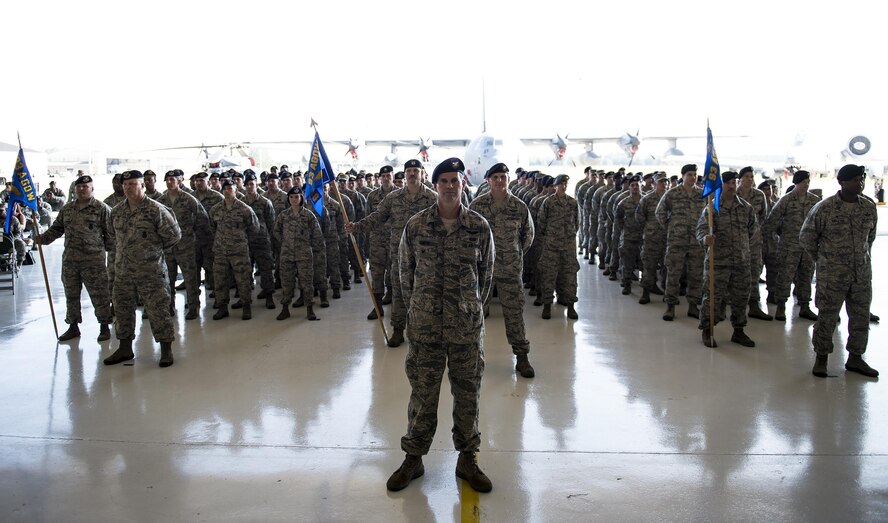 U.S. Air Force Airmen assigned to the 820th Base Defense Group prepare to render the final salute to Col. Joseph Locke, outgoing 93d Air Ground Operations Wing commander, during the 93d AGOW change of command ceremony, June 28, 2016, at Moody Air Force Base, Ga. Under Locke’s command, Airmen assigned to the 93d AGOW have deployed to every continent except Antarctica. (U.S. Air Force photo by Airman 1st Class Janiqua P. Robinson/Released)