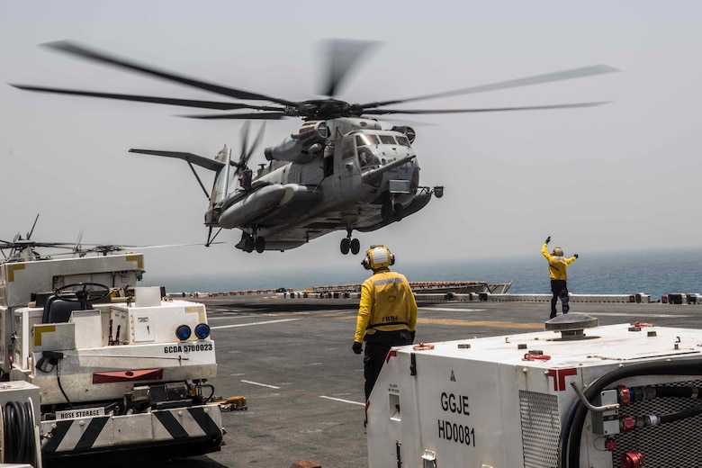 ARABIAN GULF (June 13, 2016) A U.S. Marine Corps CH-53E Super Stallion helicopter with the 13th Marine Expeditionary Unit lifts off USS Boxer (LHD 4) to off load service members for sustainment training ashore in the U.S. 5th Fleet and Central Command areas of responsibility June 13. The 13th MEU is conducting sustainment training to maintain proficiency and combat readiness while deployed with the Boxer Amphibious Ready Group during Western Pacific Deployment 16-1. (U.S. Marine Corps photo by Cpl. Alvin Pujols/ RELEASED)