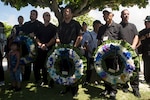 Distinguished visitors prepare to lay wreaths at the memorial walls during the 2016 Okinawa Memorial services June 23 at Peace Memorial Park, Itoman, Japan. The ceremony brought Okinawa residents and Status of Forces Agreement members together to honor those whose lives were lost in the Battle of Okinawa. During the ceremony, distinguished guest speakers gave speeches to honor the fallen in the Battle of Okinawa and laid wreaths at the memorial walls, on which the names of the fallen were engraved. Attendees, in turn, took a moment of silence and paid tribute to the fallen heroes.