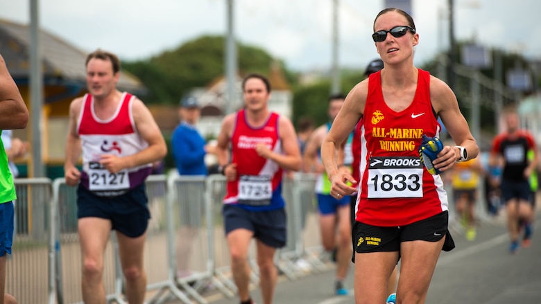 Capt. Danielle Pozun, the assistant operations officer with 1st Intelligence Battalion, Marine Corps Base Camp Pendleton, California, runs during the Torbay Half Marathon in Torbay, England, June 26, 2016. Pozun is a member of the All-Marine Running Team and competes in running events around the world to represent the U.S. Marine Corps. 