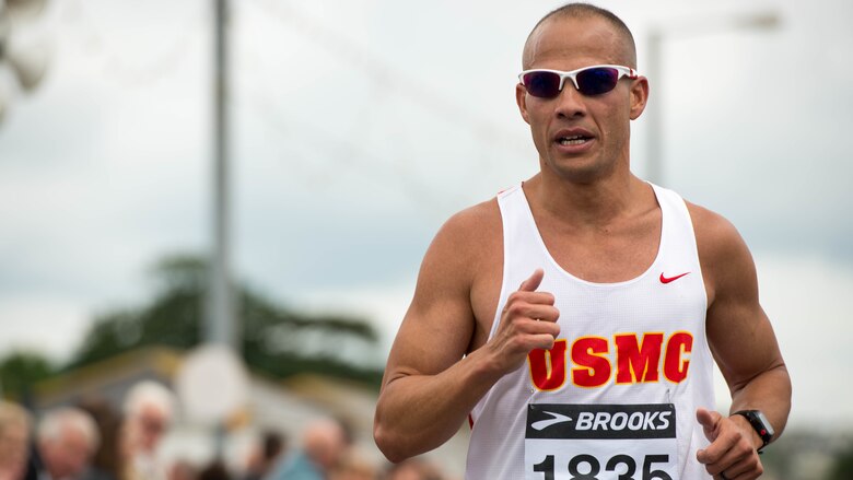 Capt. Pedro Rodriguez, a Marine officer instructor at the University of New Mexico, runs during the Torbay Half Marathon in Torbay, England, June 26, 2016. Rodrigues is a member of the All-Marine running team and competes in running events around the world to represent the U.S. Marine Corps. 
