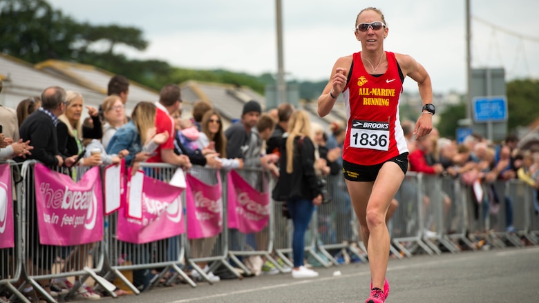 Capt. Christine Taranto, a logistics analyst with Marine Corps Systems Command, Marine Corps Base Quantico, Virginia, runs during the Torbay Half Marathon in Torbay, England, June 26, 2016. Taranto finished second among women at the half marathon with a time of 1:23:05. 