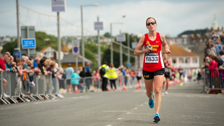 TORBAY, England – Capt. Danielle Pozun, the assistant operations officer with 1st Intelligence Battalion, Marine Corps Base Camp Pendleton, California, runs during the Torbay Half Marathon in Torbay, England, June 26, 2016. Pozun is a member of the All-Marine Running Team and competes in running events around the world to represent the U.S. Marine Corps. 