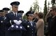 The Joint Base Elmendorf-Richardson Honor Guard carries a folded American flag into the funeral ceremony for Fred "Bulldog" Becker IV June 24. Bulldog was heavily involved in the Anchorage community, and more than 1,000 Airmen and Soldiers lined the streets for his processional, consisting of hundreds of motorcyclists from around the community. (U.S. Air Force photo by Senior Airman Kyle Johnson)