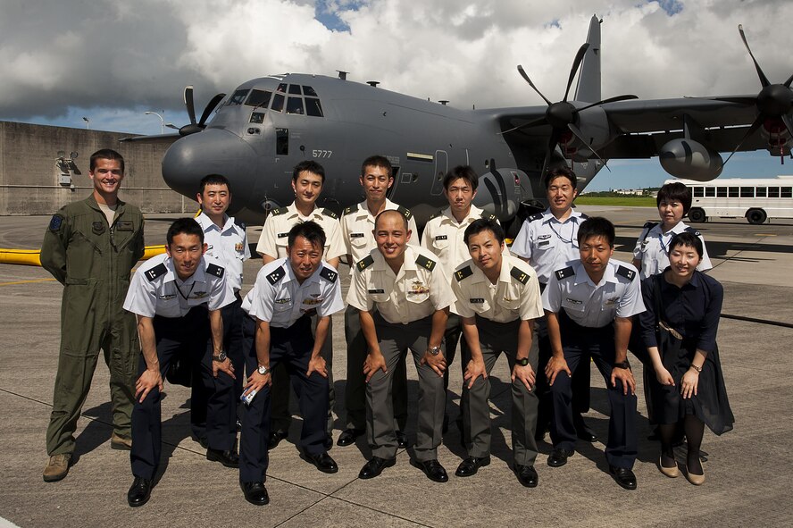 Japan Air Self-Defense Force and Japan Ground Self-Defense Force members attending the 52nd Joint Tactical Operations Course tour an MC-130J Commando II June 21, 2016, at Kadena Air Base, Japan. The JASDF and JGSDF members learned about the different parts and capabilites of the 353rd Special Operations Group during their tour, and also shared their own knowledge with U.S. Air Force members. (U.S. Air Force photo by Airman 1st Class Corey M. Pettis) 