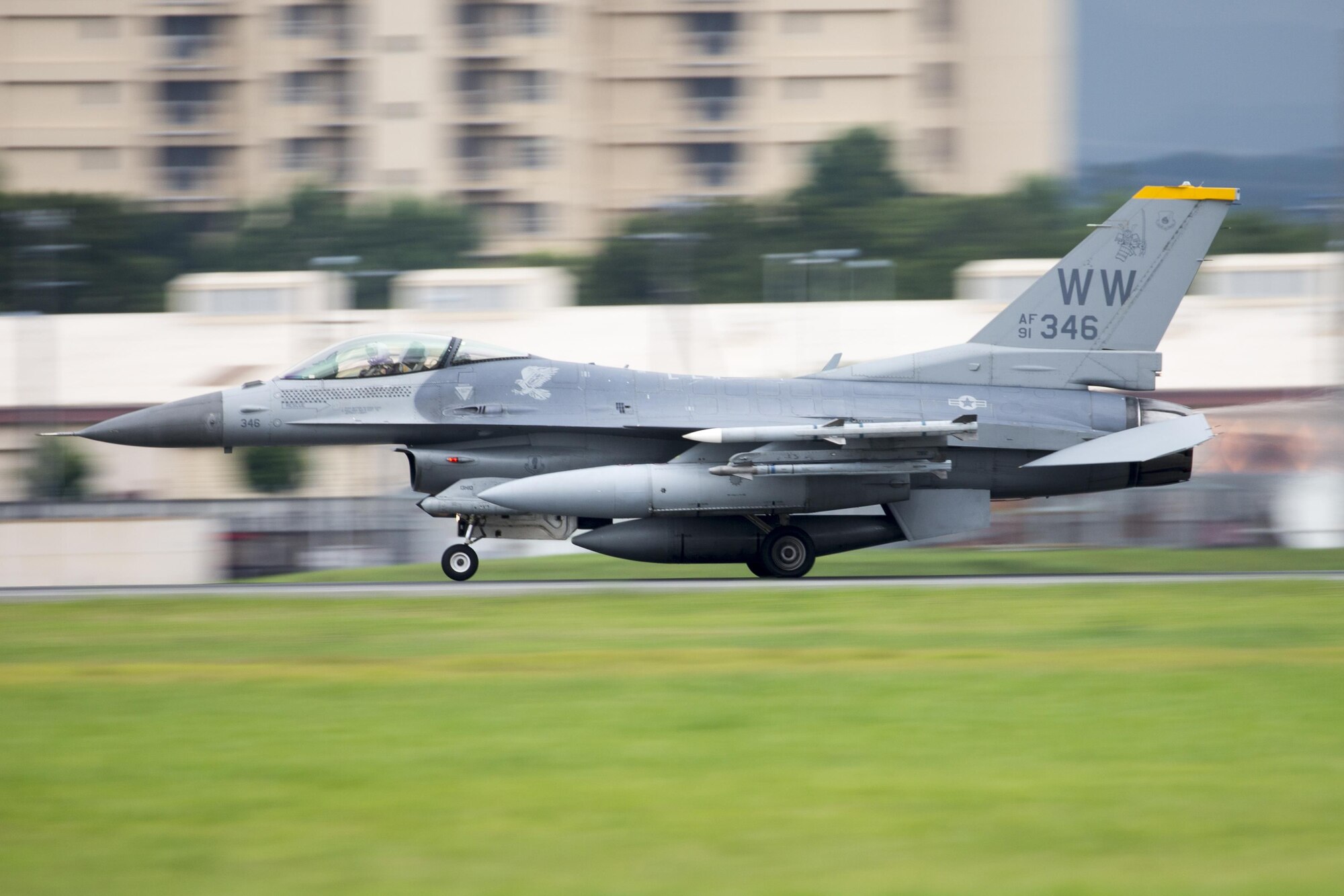 An F-16 Fighting Falcon with the 35th Fighting Wing takes off at Yokota Air Base, Japan, June 24, 2016. An afterburner is a secondary combustion system which burns additional fuel downstream of the combustion chamber, to further increase thrust at the expense of much higher fuel consumption. (U.S. Air Force photo by Yasuo Osakabe/Released)
