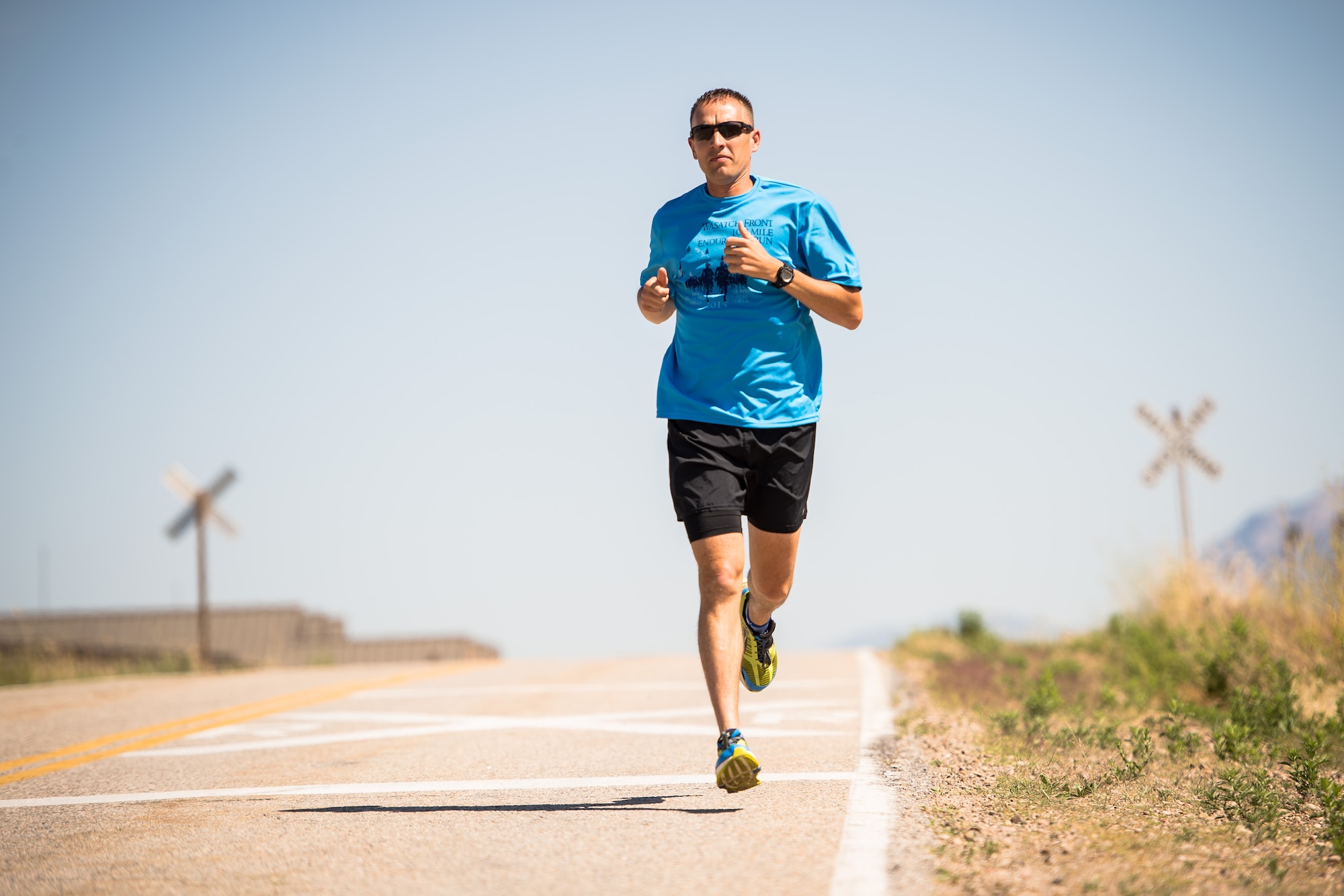 Capt. Jared Struck, an aircraft maintenance officer assigned to the Ogden Air Logistics Complex, runs at Hill Air Force Base, June 27. Struck is training to run the Badwater ultramarathon in July and will raise money for Fisher House, an organization that benefits military families with no-cost housing near medical facilities when loved ones are receiving medical treatment. (U.S. Air Force photo by R. Nial Bradshaw)