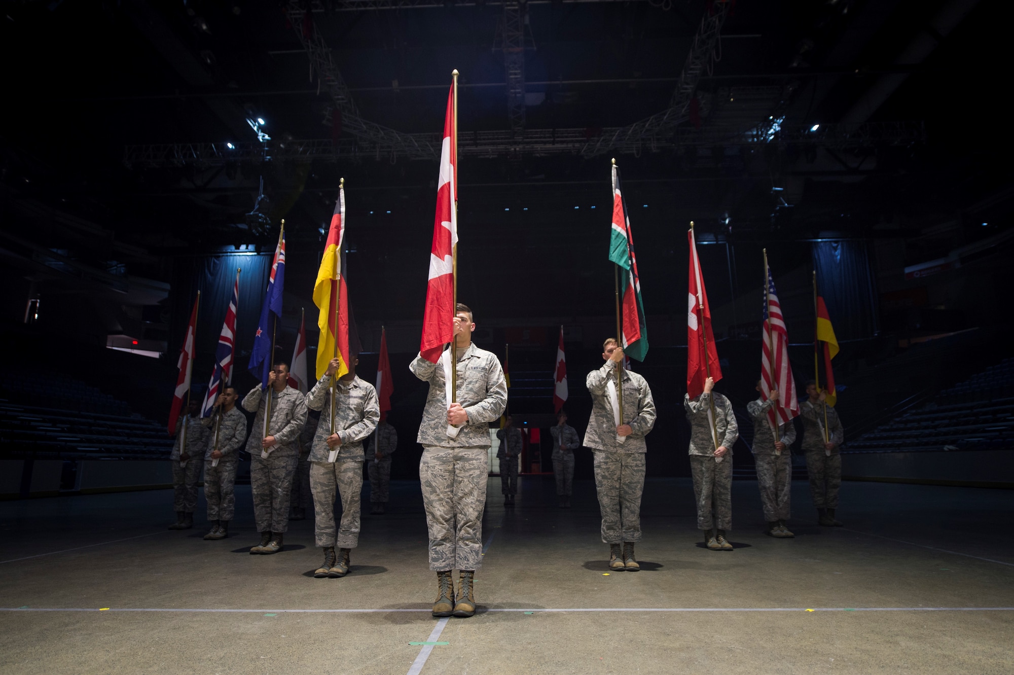 Members of the U.S. Air Force Honor Guard Drill Team practice with flags of participating countries during a 2016 Royal Nova Scotia International Tattoo rehearsal at the Scotiabank Centre in Halifax, Nova Scotia, June 25, 2016. The flag presentations are part of opening ceremonies for the event. (U.S. Air Force photo by Senior Airman Ryan J. Sonnier)