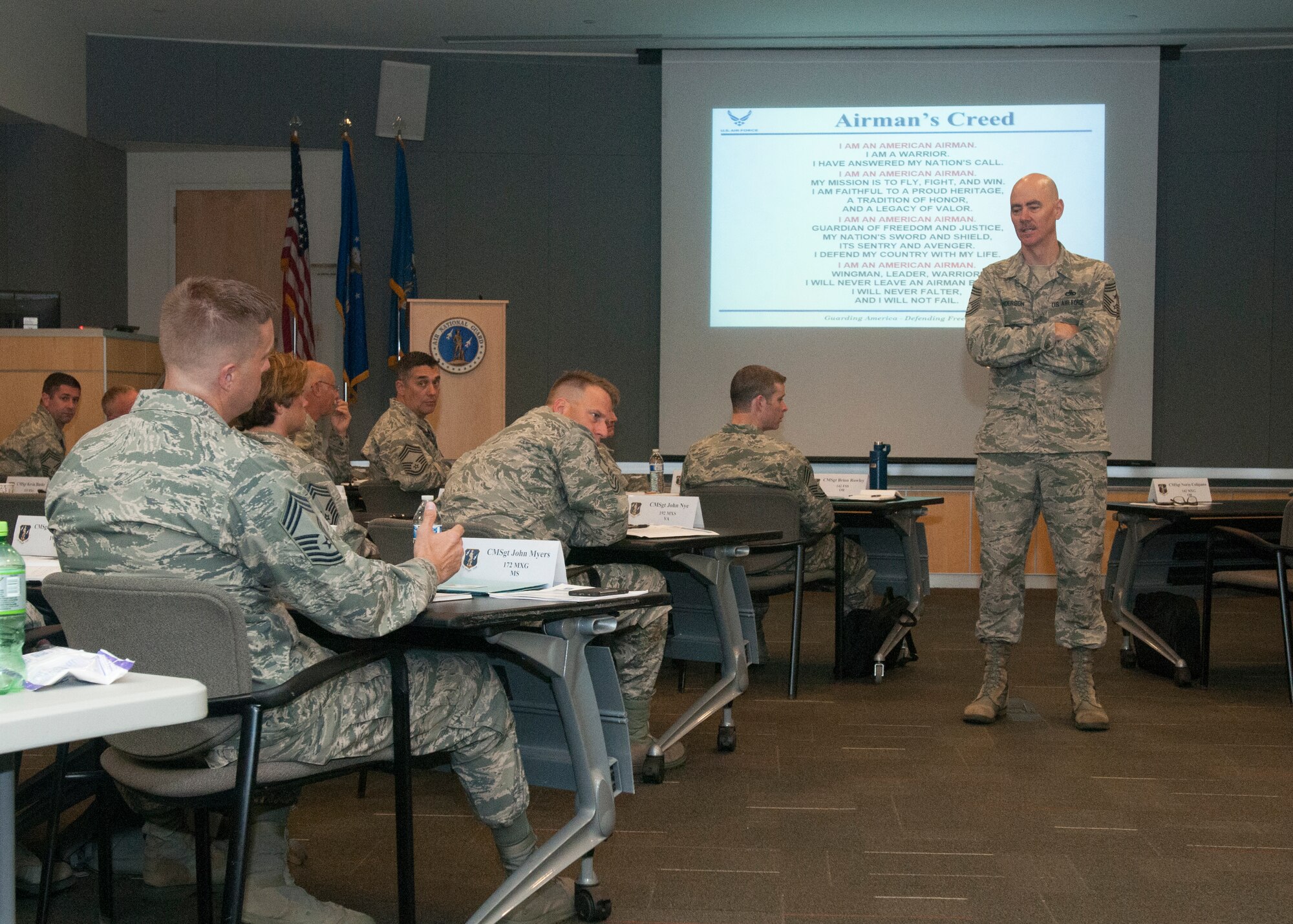 Chief Ronald C. Anderson, the 12th Air National Guard Command Chief listens to question from newly promoted ANG chief during Chiefs Executive Course at the ANG Readiness Center, Joint Base Andrews June 21, 2016. CEC is a weeklong course designed to provide new chief master sergeants with a broad view of ANG and Air Force operations and provide them with tools to operate effectively at the tactical and operational levels. (U.S. Air National Guard Photo by Master Sgt. David J. Fenner /RELEASED)