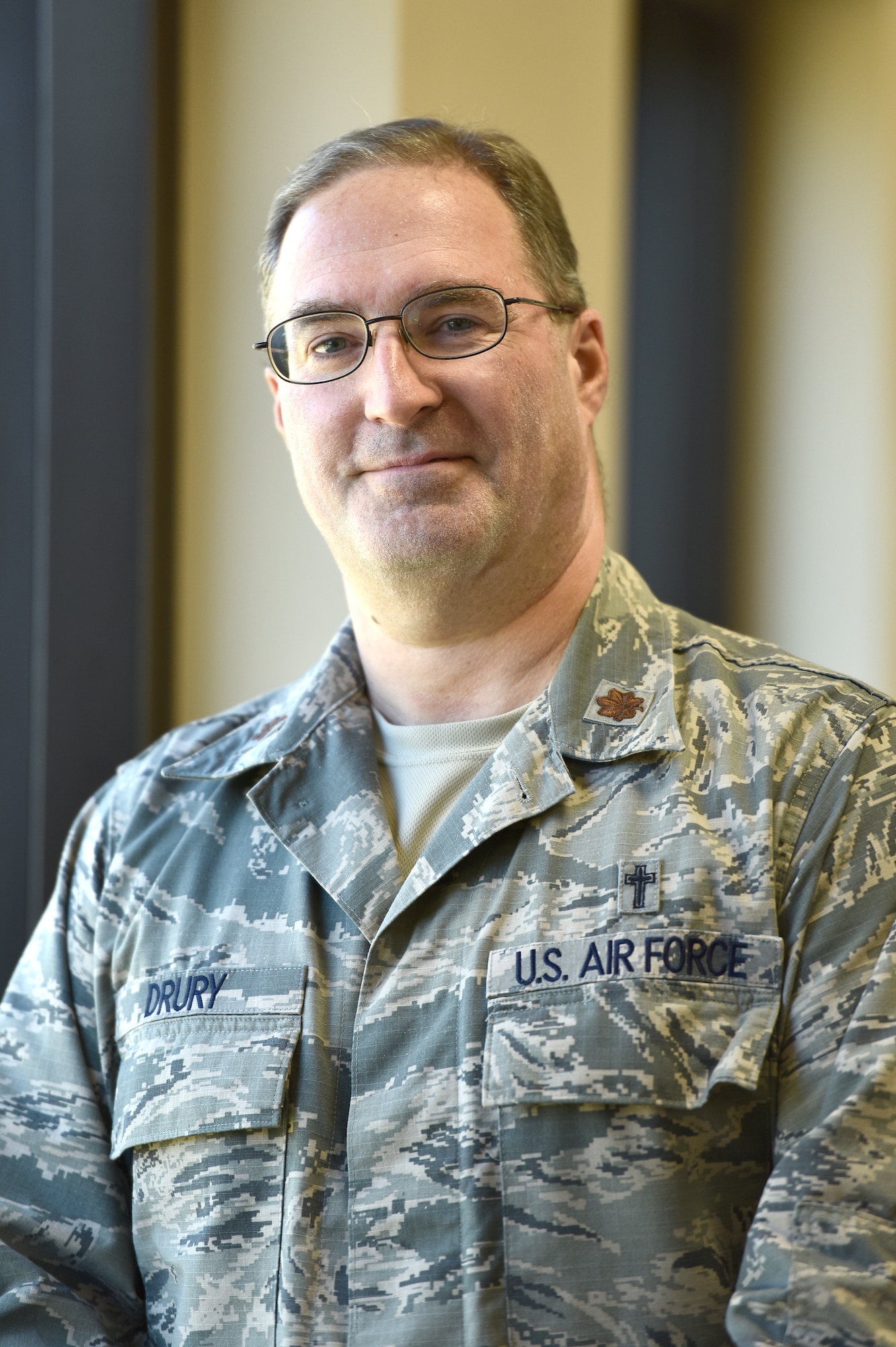 Maj. Peter Drury, a chaplain with the 180th Fighter Wing, Ohio Air National Guard poses for a photo during annual training in Alpena, Michigan.