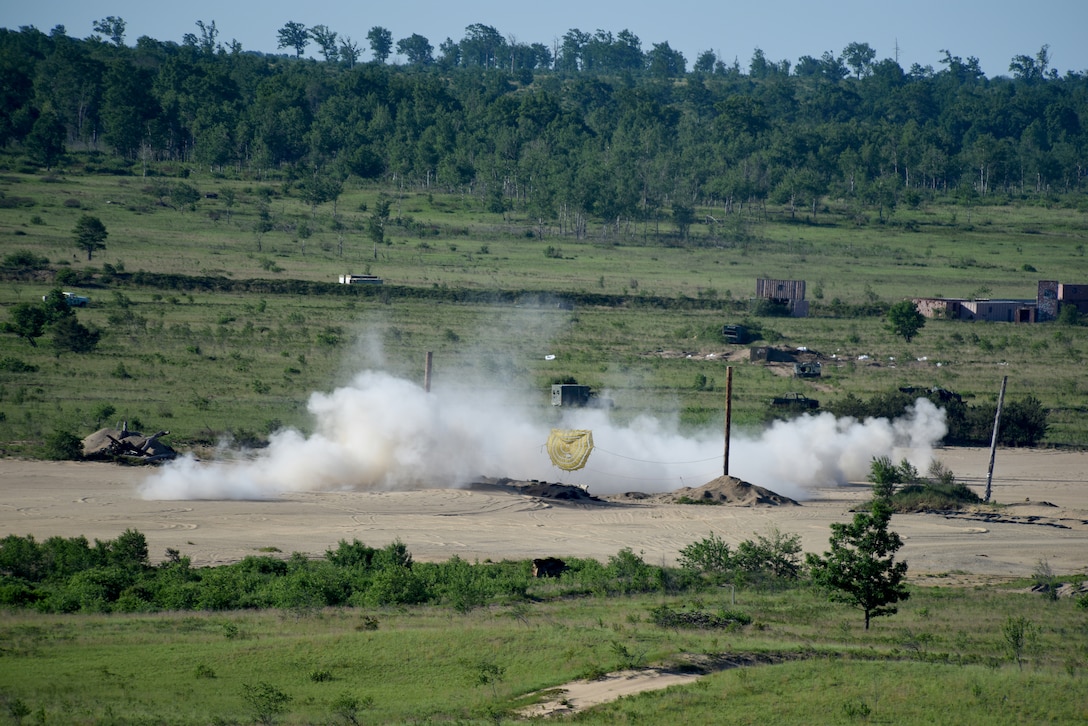 Pilots with the 180th Fighter Wing in Swanton, Ohio simulate flying combat operations at Alpena Combat Readiness Training Center in Alpena, Michigan on June 21. More than 6,000 rounds and 70,000 pounds of munitions were dropped at the Grayling Air Gunnery Range. An increased operational tempo provides an opportunity to assess the 180FW’s ability to conduct surge operations similar to what is experienced in a deployed combat scenario. U.S. Air National Guard photo by Staff Sgt. John Wilkes.