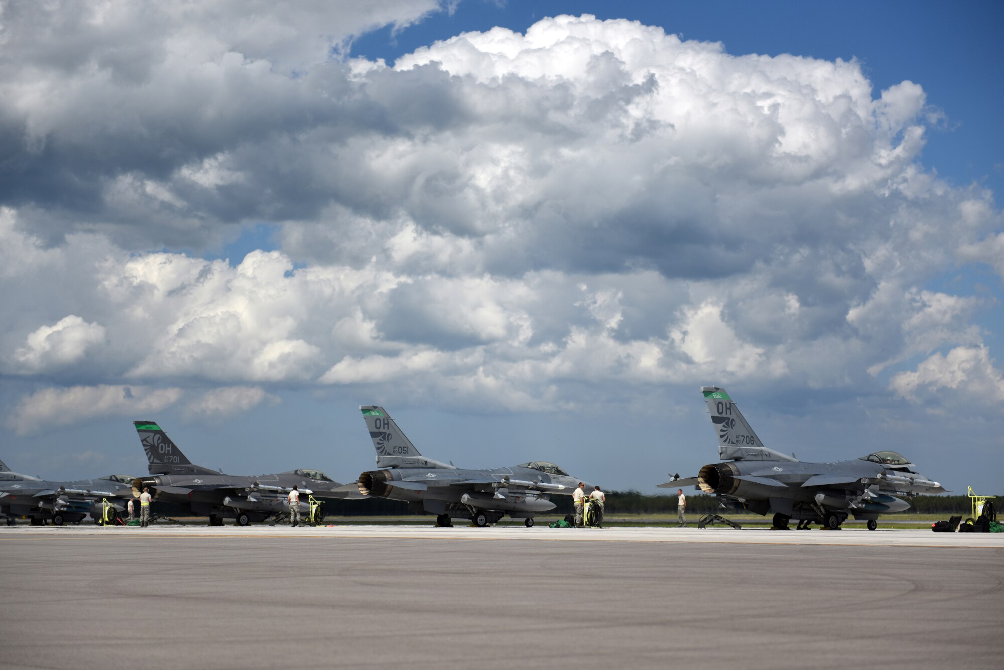 Pilots with the 180th Fighter Wing in Swanton, Ohio simulate flying combat operations at Alpena Combat Readiness Training Center in Alpena, Michigan on June 21. More than 6,000 rounds and 70,000 pounds of munitions were dropped at the Grayling Air Gunnery Range. An increased operational tempo provides an opportunity to assess the 180FW’s ability to conduct surge operations similar to what is experienced in a deployed combat scenario. U.S. Air National Guard photo by Staff Sgt. John Wilkes.