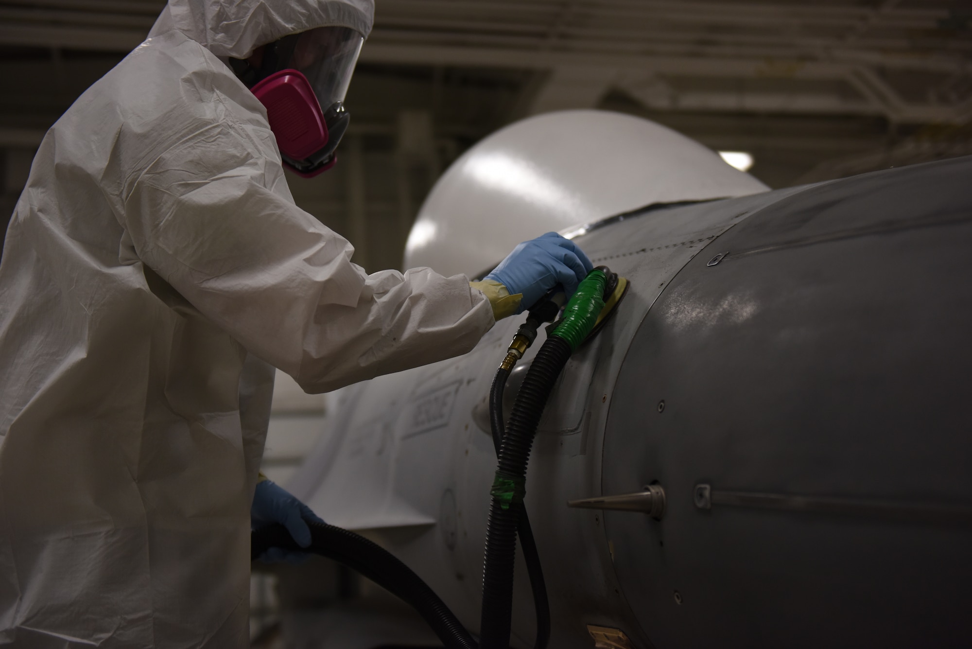 An Airman with the 180th Fighter Wing structural maintenance shop prepares an F-16 Fighting Falcon to be painted. Aircraft structural maintenance specialists go through extensive training to learn how to identify, treat and prevent various types of corrosion to increase the lifespan of the aircraft. U.S. Air National Guard photo by Staff Sgt. John Wilkes.