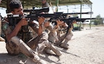 Iraqi soldiers practice their sitting firing position earlier this month at Camp Taji, Iraq. Defense Secretary Ash Carter has priased Iraqi security forces for their work in liberating the city of Fallujah from ISIL. (U.S. Army photo by Spc. Jessica Hurst)