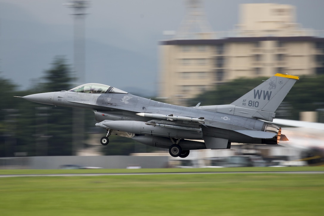 An F-16 Fighting Falcon from the 35th Fighter Wing takes off at Yokota Air Base, Japan, June 24, 2016. An F-16 uses afterburner in short bursts during takeoff, climb, or combat maneuvers. (U.S. Air Force photo by Yasuo Osakabe/Released)