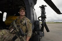 U.S. Air Force Staff Sgt. Clifford Crawford, 31st Rescue Squadron pararescue element leader, sits in an HH-60 Pave Hawk on the flight line at Kadena Air Base, Japan, June 27, 2016. Crawford was born in Skiatook, Oklahoma, May 28, 1992. He attended Skiatook High School and graduated as class vice president in May 2010. (U.S. Air Force photo by Senior Airman Stephen G. Eigel)