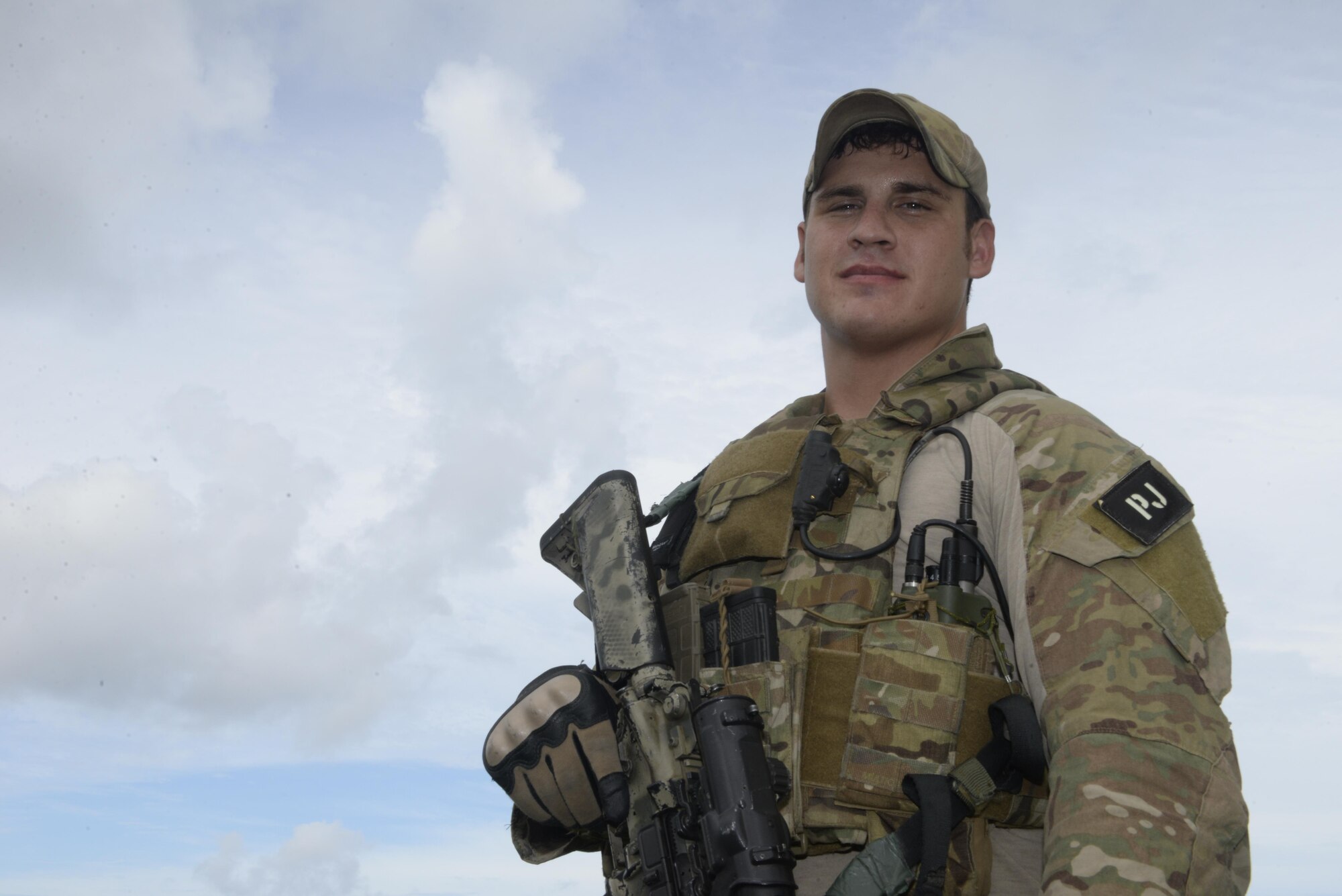 U.S. Air Force Staff Sgt. Clifford Crawford, 31st Rescue Squadron pararescue element leader, poses for a photo at Kadena Air Base, Japan, June 27, 2016. He won the 2016 Air Force Service Member of the Year award for demonstrating a high level of professionalism, concern for fellow service members, and commitment to community service during the Nepal Earthquakes in 2015. (U.S. Air Force photo by Senior Airman Stephen G. Eigel)