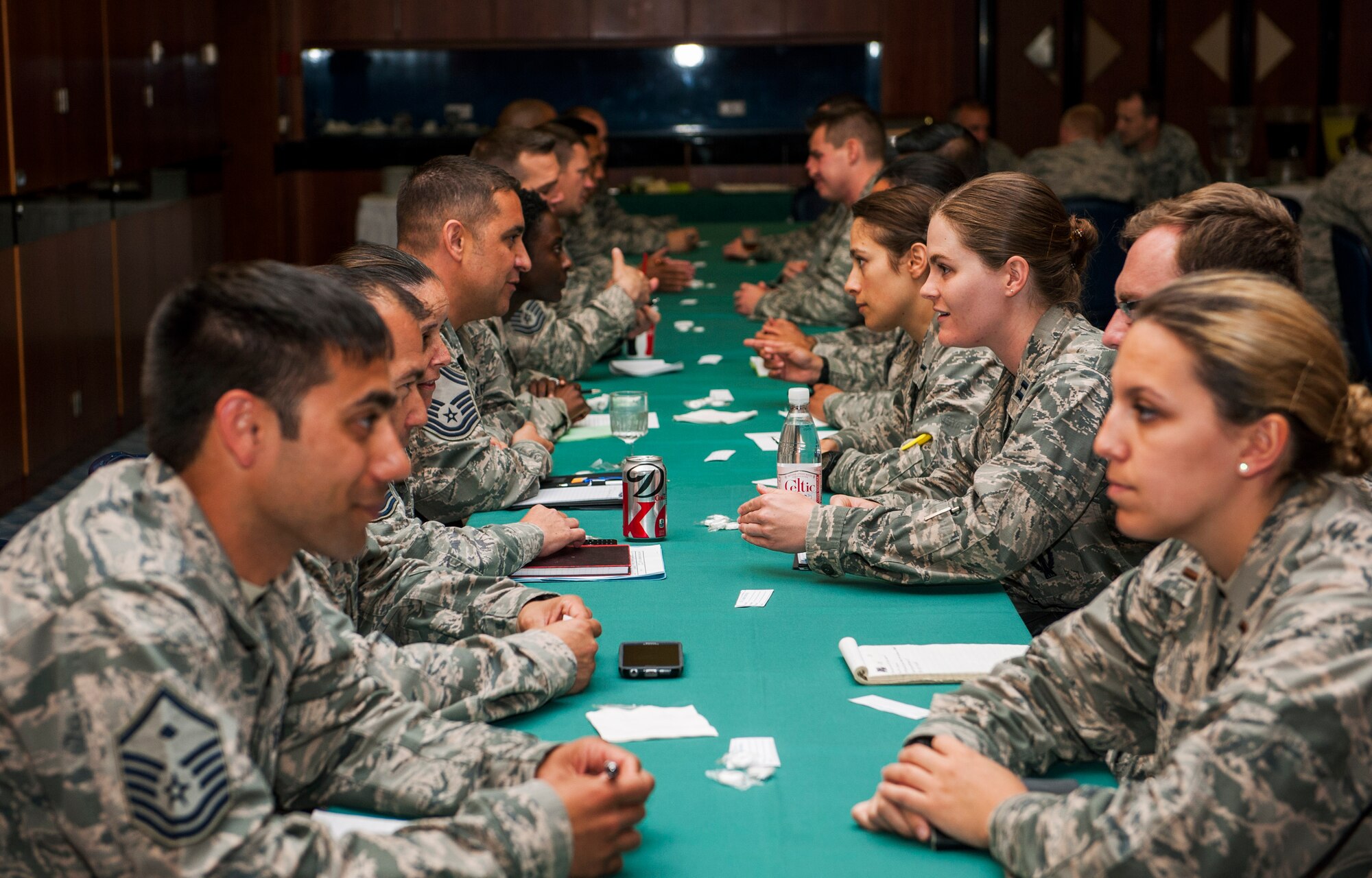 U.S. Air Force officers and senior NCOs discuss leadership tips during a speed mentoring session at Club Eifel on Spangdahlem Air Base, Germany, June 28, 2016. The session encouraged company grade officers to ask questions and exchange contact information to broaden their perspectives on leadership from senior enlisted members. (U.S. Air Force photo by Airman 1st Class Timothy Kim/Released)