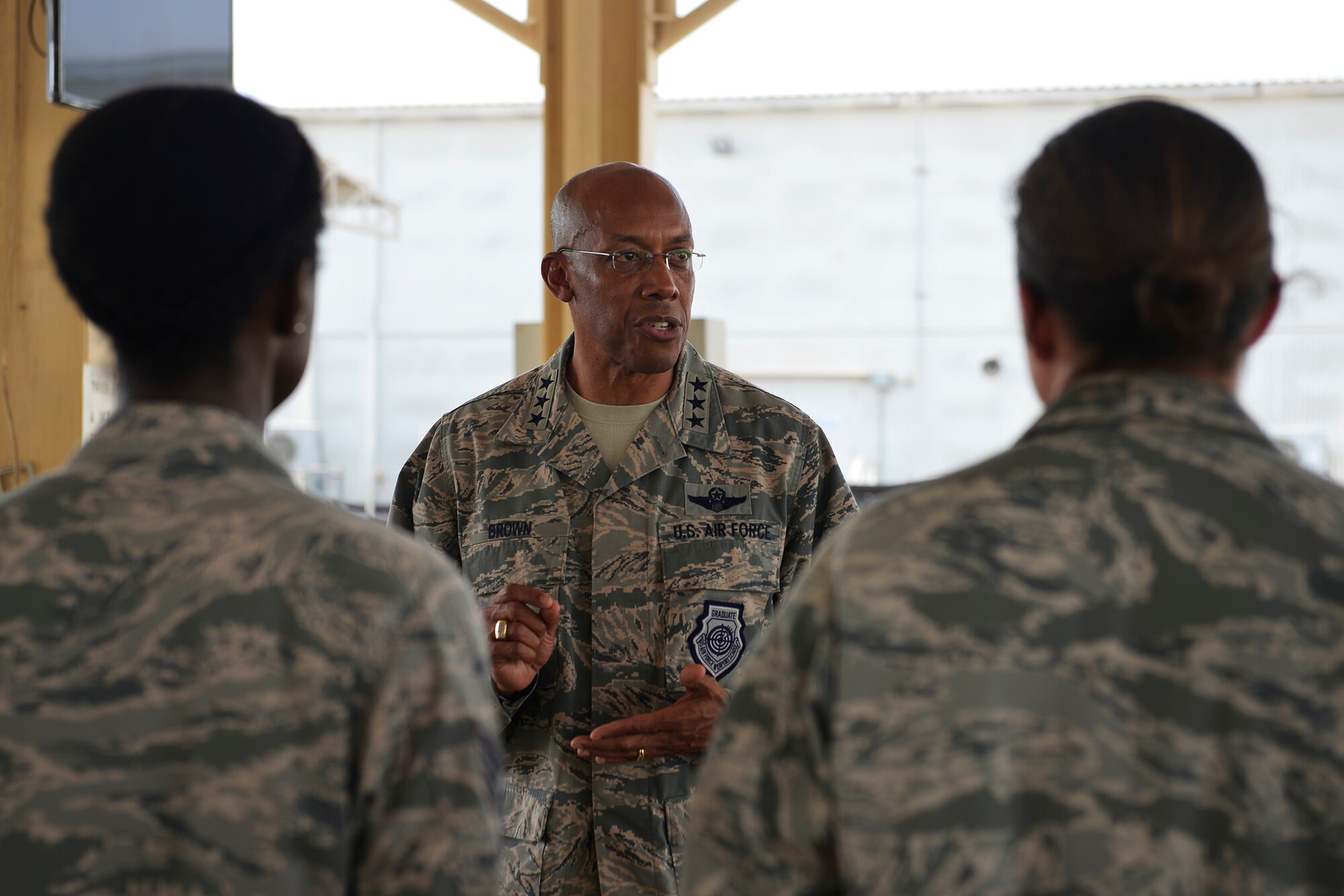 Brig. Gen. Charles Corcoran, 380th Air Expeditionary Wing commander, right, greets Lt. Gen. Charles Q. Brown, Jr., U.S. Air Forces Central Command commander, upon his arrival at an undisclosed location in Southwest Asia June 28, 2016. Brown visited the location to interact with members of the wing and to officiate over the 380th AEW change of command ceremony. (U.S. Air Force photo by Tech. Sgt. Chad Warren)