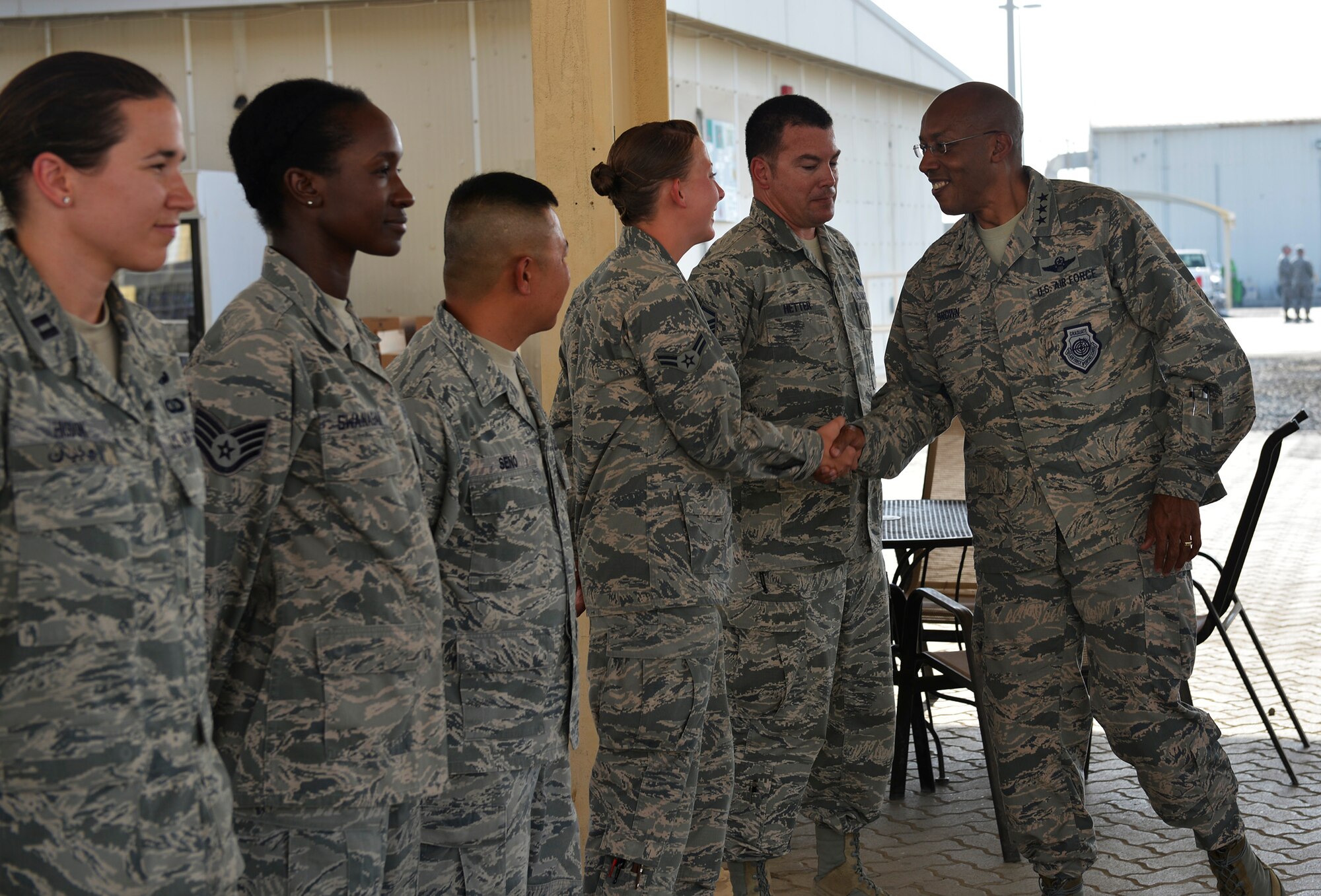 Lt. Gen. Charles Q. Brown, Jr., U.S. Air Forces Central Command commander, meets with members of the 380th Air Expeditionary Wing during his trip to an undisclosed location in Southwest Asia June 28, 2016. Brown visited the location to interact with members of the wing and to officiate over the 380th AEW change of command ceremony. (U.S. Air Force photo by Tech. Sgt. Chad Warren)