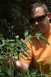 U.S. Army Staff Sgt. Michael Hutcheson, South Carolina National Guard, gardens at his home in Irmo, South Carolina, June 27, 2016, in order to gain a sense of purpose separate from being a Soldier to combat certain Post Traumatic Stress Disorder symptoms. Hutcheson has been battling PTSD as a result of multiple combat deployments in support of both Operation Iraqi Freedom and Operation Enduring Freedom.