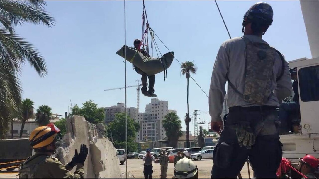 An 8-man team from Chemical Biological Incident Response Force, CBIRF, represented the unit with 74 other American service members during Exercise United Front V in Israel, June 17-25, 2016. Other units that participated in the exercise included the Indiana 19th Chemical, Biological, Radiological, Nuclear and High-Yield Explosive Enhanced Response Force Package – 19th CERF-P, Indiana Task Force 1, Virginia Task Force 1, Bloomington Fire Department, Joint Force Headquarters National Capital Region, and 120th Public Affairs Department.The exercise, hosted by the Israeli Defense Force and coordinated by the Indiana National Guard, strengthened existing bilateral relationships by ensuring interoperability with other military services, and civilian as well as international agencies to improve search and extraction capabilities of all participating units. (Courtesy Photo)