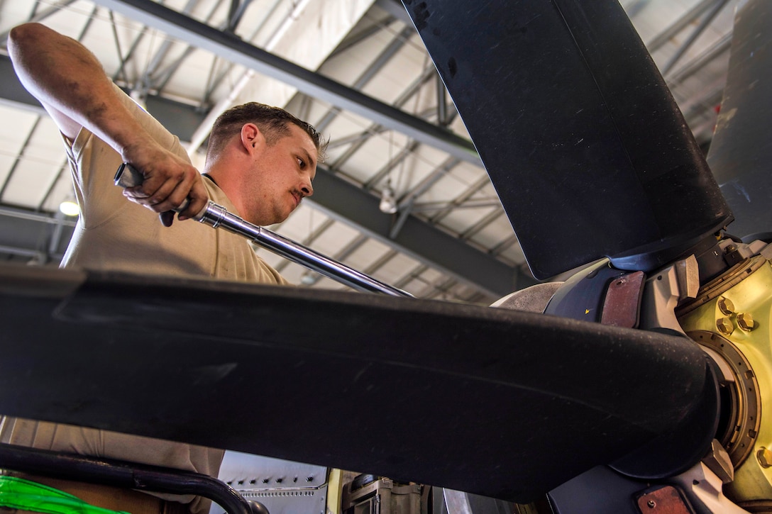 Senior Airman Charles Pearce uses a torque wrench to tighten bolts on a C-130J Super Hercules aircraft at Bagram Airfield, Afghanistan, June 27, 2016. Pearce is an engine maintainer assigned to the 455th Expeditionary Aircraft Maintenance Squadron. Air Force photo by Senior Airman Justyn M. Freeman