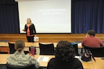 Elizabeth Kuhlmann, Randolph Brooks Credit Union, business development officer, teaches a class in understanding your credit, June 24, at the Military and Family Readiness Center, Joint Base San Antonio-Randolph.  Personal Financial Readiness Services provide patrons with the tools and information needed to develop individual strategies, achieve financial goals, and address financial challenges.  (U.S. Air Force photo by Joel Martinez/Released)