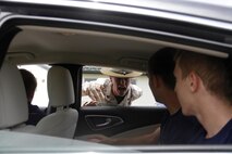 Staff Sgt. Jamie L. Murray, a Company P, 4th Battlation, Marine Corps Recruit Depot Parris Island chief drill instructor, instructs poolees to exit their vehicle after they arrived for Marine Corps Recruiting Station Kansas City's all-hands pool functionat Camp Clark in Nevada, Mo., June 24, 2016.