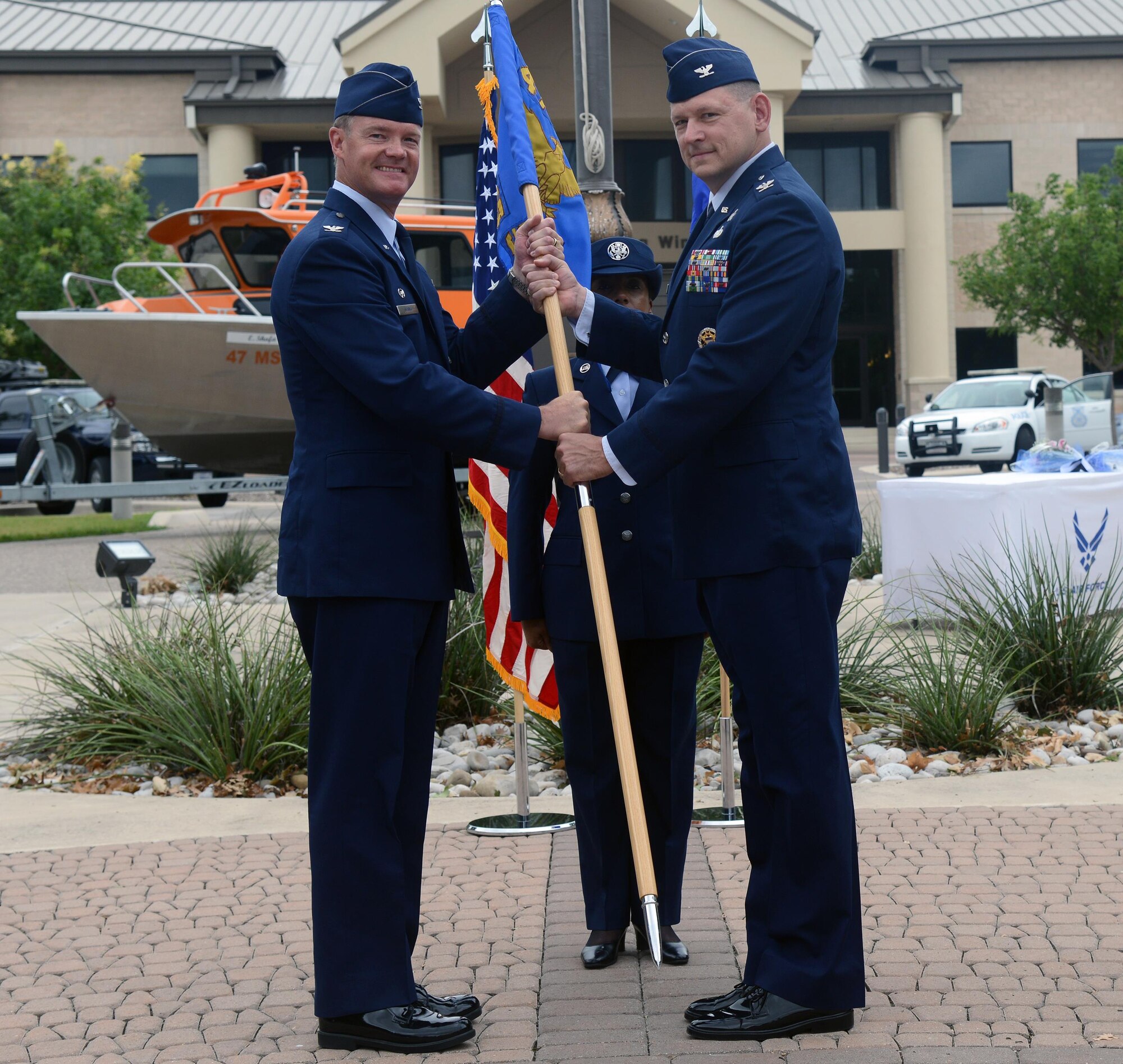 Col. Brian Hinsvark, right, 47th Mission Support Group commander, poses for a photo with Col. Thomas Shank, 47th Flying Training Wing commander, during a change of command at Laughlin Air Force Base, Texas, June 27, 2016. Hinsvark came to Laughlin from his previous position as a student at the Naval War College, Newport, R.I. (U.S. Air Force photo/Airman 1st Class Brandon May)