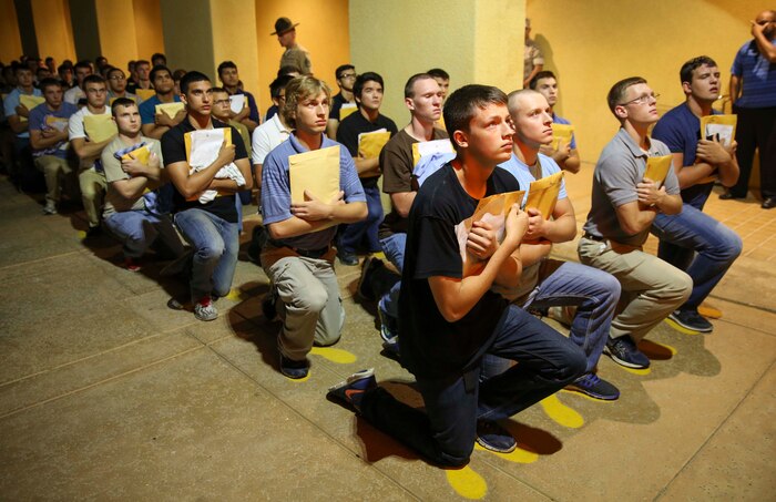Recruits of Fox Company, 2nd Recruit Training Battalion, receive their Uniform Code of Military Justice brief at Marine Corps Recruit Depot San Diego, June 27. At this point, recruits are informed of the articles of the UCMJ that apply to them while they are in recruit training. Annually, more than 17,000 males recruited from the Western Recruiting Region are trained at MCRD San Diego. Fox Company is scheduled to graduate Sept. 23.