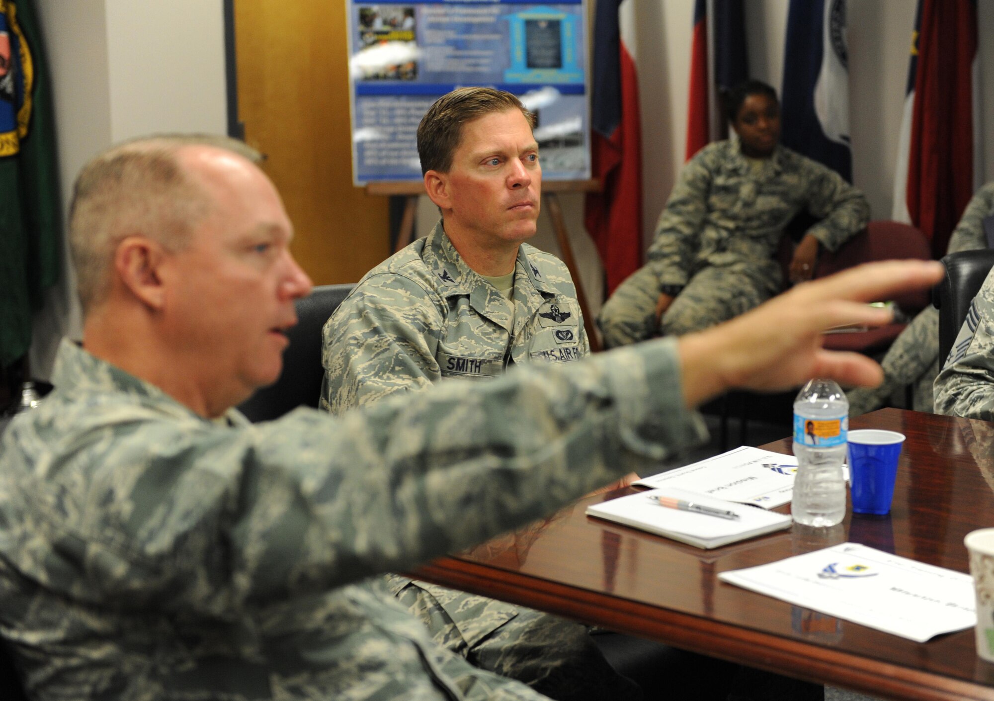 Col. C. Mike Smith, 81st Training Wing vice commander, receives a briefing from Col. Scott Solomon, 81st Training Group commander, during an immersion tour at the Levitow Training Support Facility June 22, 2016 on Keesler Air Force Base, Miss. The purpose of the tour was to become familiar with the group’s mission, operations and personnel. (U.S. Air Force photo by Kemberly Groue/Released)