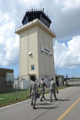 Col. C. Mike Smith, 81st Training Wing vice commander, walks to the air traffic control tower for a tour during an 81st Mission Support Group immersion tour June 24, 2016 on Keesler Air Force Base, Miss. The purpose of the tour was to become familiar with the group’s mission, operations and personnel. (U.S. Air Force photo by Kemberly Groue/Released)