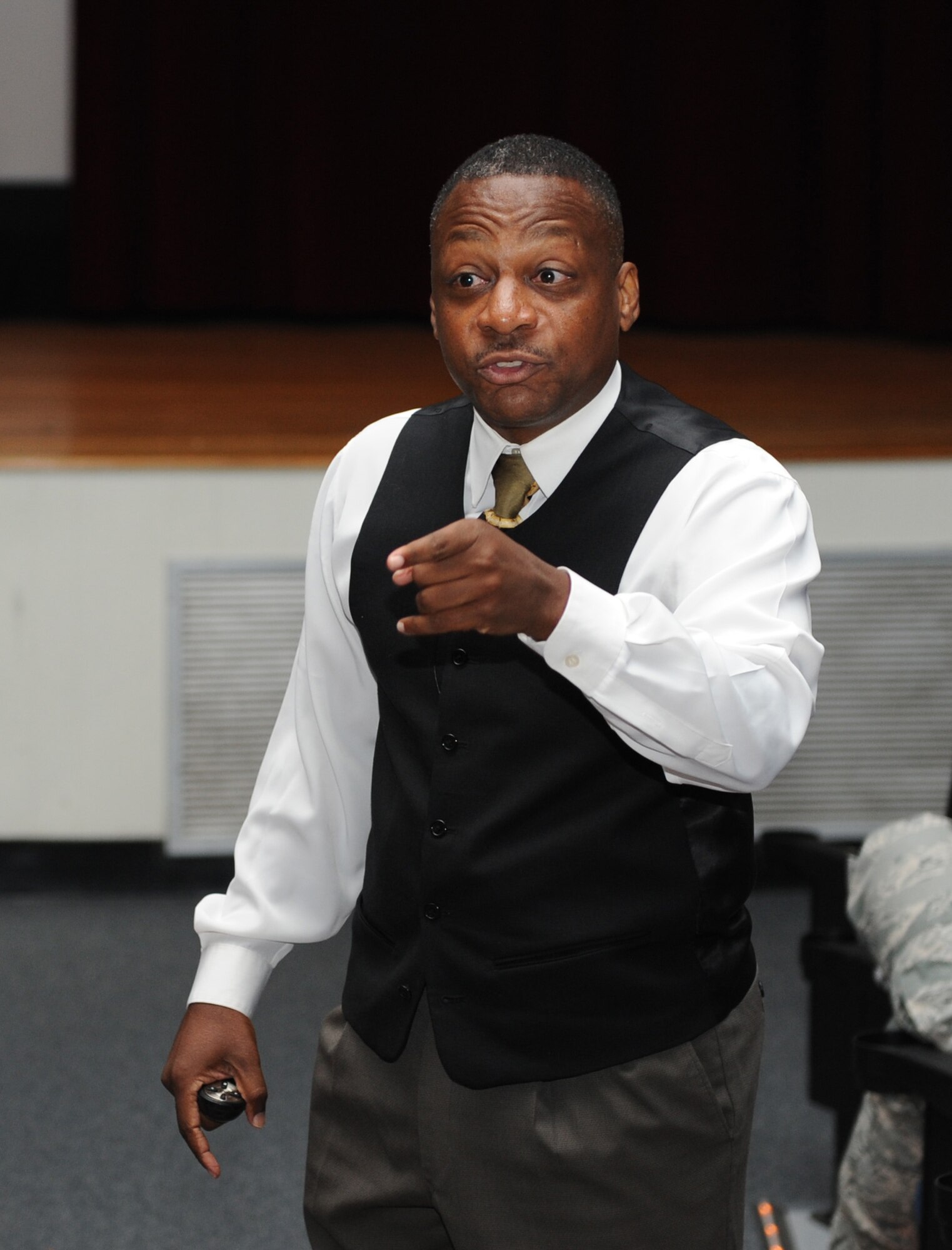 Retired Chief Master Sgt. Anthony Brinkley speaks at a leadership and personal development seminar at the Welch Theater June 24, 2016 on Keesler Air Force Base, Miss. Brinkley, with more than 28 years of military experience, is delivering seminars highlighting leadership development, motivational speaking and team building to military members and civilians at all 2nd Air Force bases. (U.S. Air Force photo by Kemberly Groue/Released)