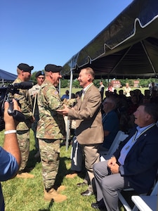 FORT KNOX, Kentucky (June 10, 2016) – Retired Col. Gerald W. Meyer, right, a U.S. Army Reserve Ambassador for Wisconsin and the 88th Regional Support Command, shakes hands with U.S. Army Cadet Command and Fort Knox Commanding General Maj. Gen. Christopher Hughes after Meyer was presented with a medallion honoring his selection as an inaugural member of the Cadet Command Hall of Fame during a ceremony June 10 at Fort Knox’s Brooks Field.
(U.S. Army photo provided by Col. Michael Holland, 88th Regional Support Command/Released)