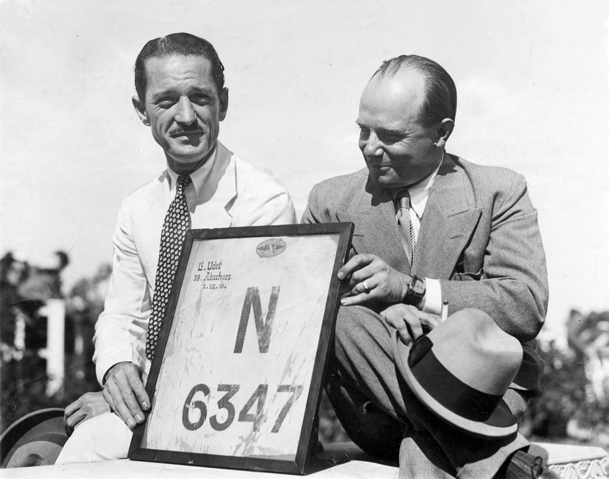 Lt. Walter B. Wanamaker and German pilot Ernst Udet with the fabric from the rudder of Wanamaker's Nieuport 28. (U.S. Air Force photo)