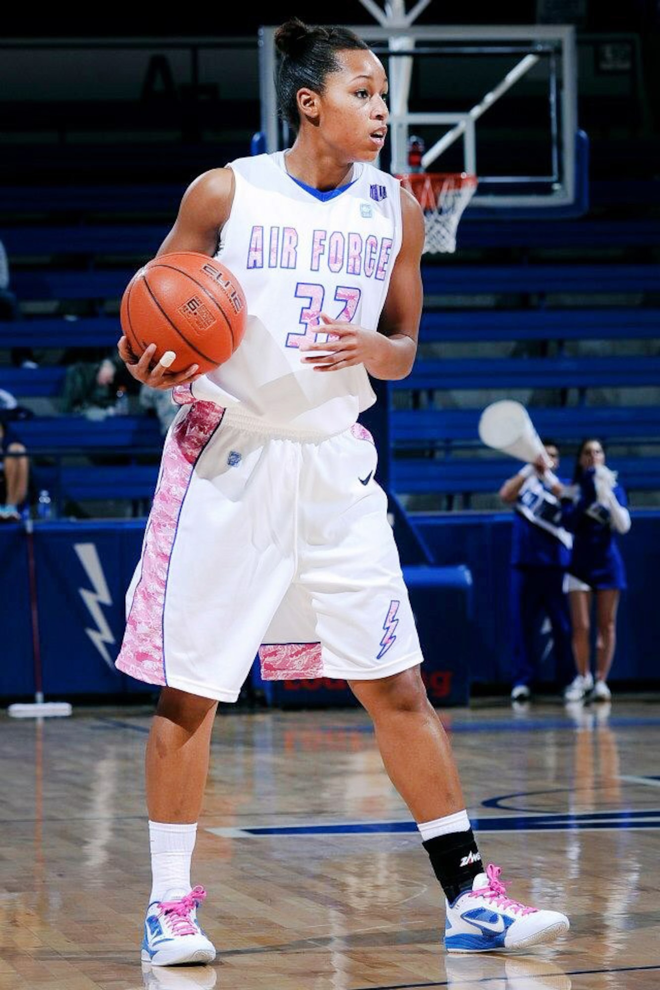 1st Lt. Dymond James, 460th Operations Group staff instructor, participates in a game during her 2012-2013 season. James recently made the U.S. Air Force Women’s Basketball Team and will be competing in a tournament against other branches of service. (Courtesy photo)