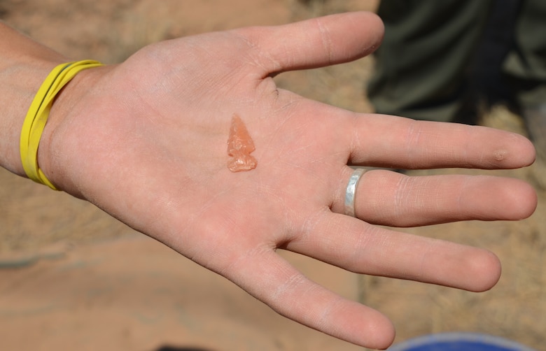ABIQUIU LAKE, N.M. – Teaching assistant Delaney Cooley holds the arrowhead she found moments earlier while screening excavated dirt at the Palisade Ruin site, June 21, 2016. The arrowhead will be analyzed further at the University of Oklahoma and then returned to the Corps.