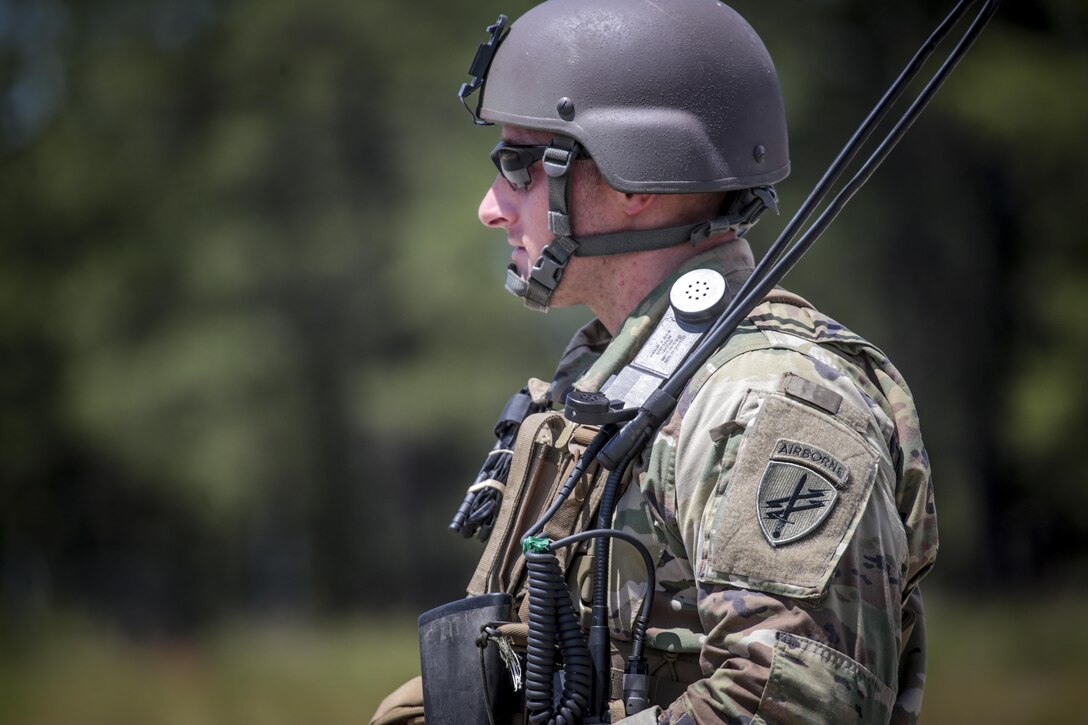 A U.S. Army Reserve Soldier from the 404th Civil Affairs Battalion provides security for a simulated casualty while waiting for a MEDEVAC helicopter during Exercise Gridiron at Joint Base McGuire-Dix-Lakehurst, N.J., June 27, 2016. (U.S. Air National Guard photo by Tech. Sgt. Matt Hecht/Released)