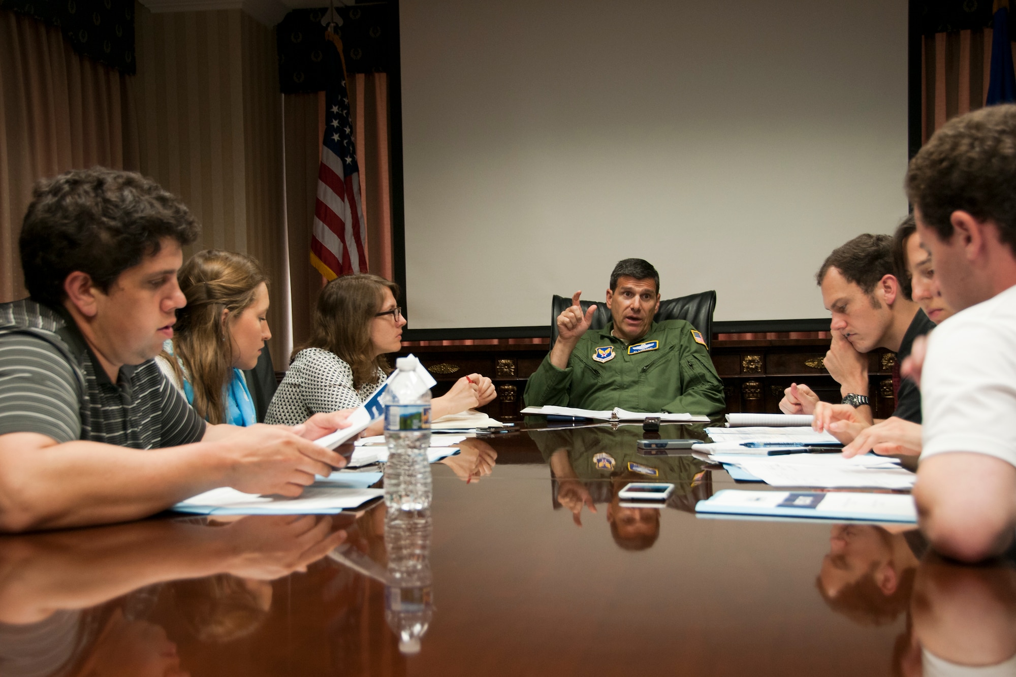 Brigadier Gen. Albert V. Lupenski, Headquarters U.S. Air Force Reserve Plans, Programs and Requirements director, provides an Air Force Reserve Command C-130 mission briefing to media at the distinguished visitor’s lounge at the passenger terminal at Joint Base Andrews, Md., June 28, 2016. In honor of the 100th anniversary of U.S. air reserve power, media members were invited to an event showcasing special missions conducted by C-130s in AFRC, to include weather surveillance, firefighting and aerial spraying. (U.S. Air Force photo/Staff Sgt. Kat Justen) 