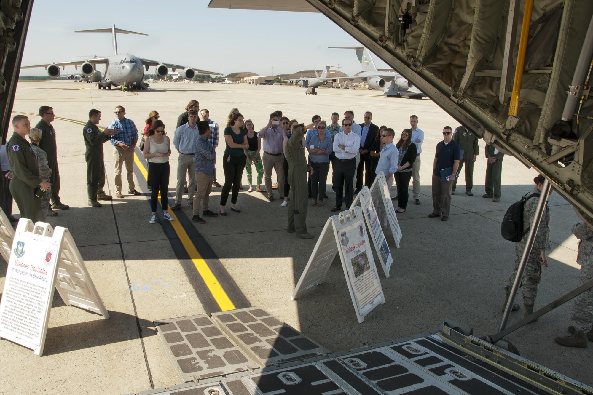 Major Brad Roundtree, 53d Weather Reconnaissance Squadron pilot, discusses his unit’s mission with congressional staff members on the Joint Base Andrews, Md., flight line June 28, 2016. In honor of the 100th anniversary of air reserve power, members of the 53d WRS visited Andrews to participate in a C-130 Hercules special-missions demonstration. The 53d WRS is the only flying weather reconnaissance unit in the world flying routine missions to survey tropical and winter storms. (U.S. Air Force photo/Staff Sgt. Kat Justen)