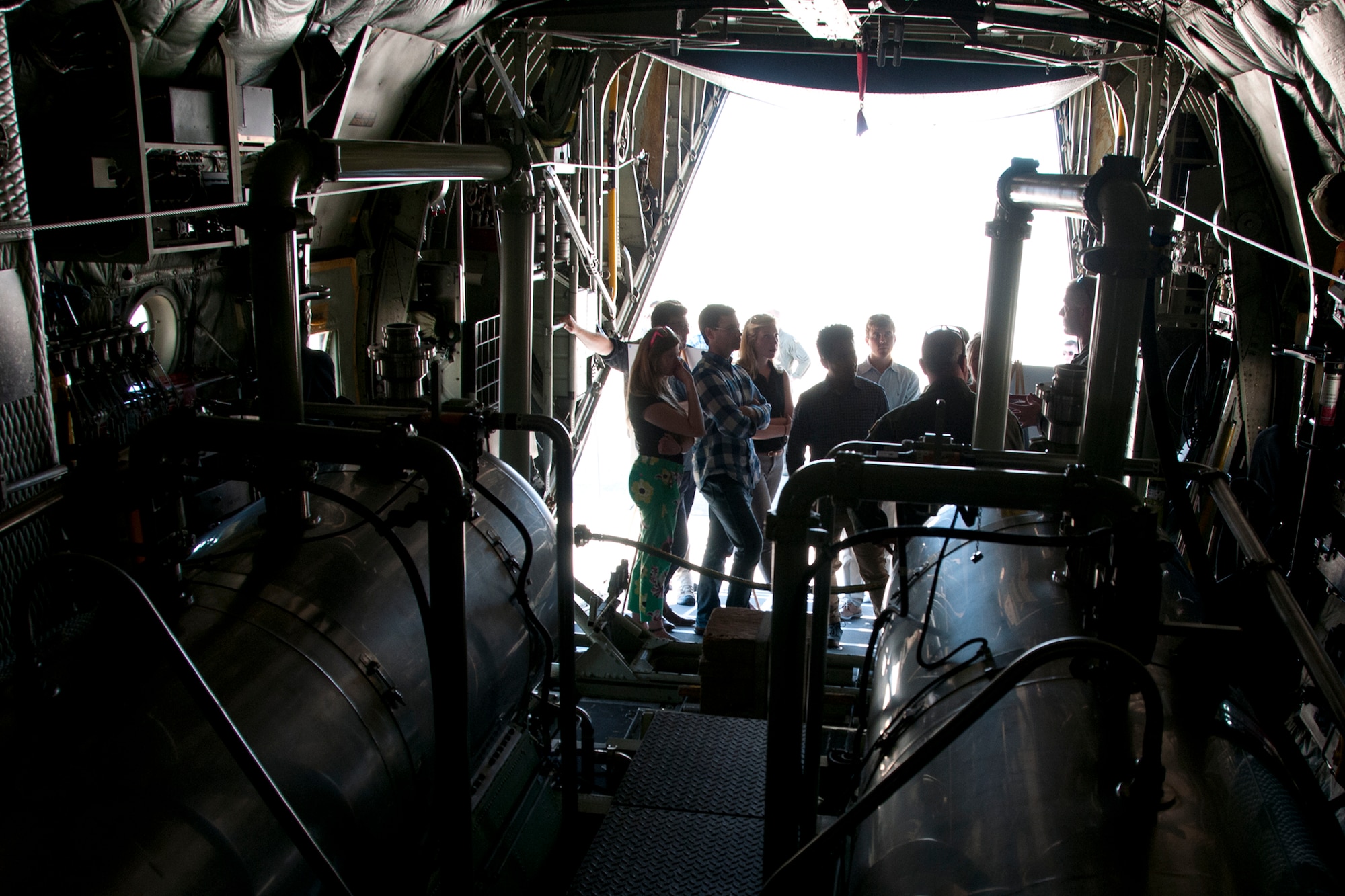 Lieutenant Col. Karl Haagsma, 757th Airlift Squadron medical entomologist (right), discusses his unit’s mission with congressional staff members on the Joint Base Andrews, Md., flight line June 28, 2016. In honor of the 100th anniversary of air reserve power, members of the 53d WRS visited Andrews to participate in a C-130 Hercules special-missions demonstration. The 757th AS has the specialized mission of aerial spray capability to control disease-carrying insects, pest insects, undesirable vegetation and to disperse oil spills in large bodies of water. (U.S. Air Force photo/Staff Sgt. Kat Justen) 