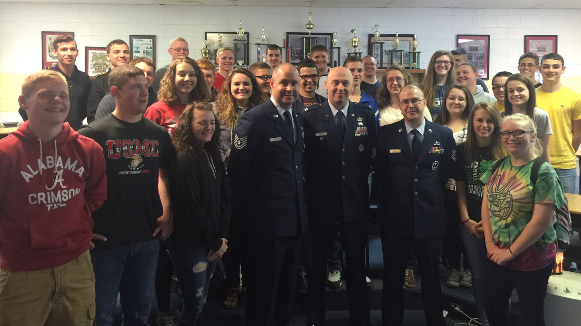 Tech. Sgt. Casey Davis, Col. Danny Davis and Tech. Sgt. Jason Miller are surrounded by Junior ROTC cadets in Wayne County, Kentucky. (U.S. Air Force photo/Senior Master Sgt. John Roy)

