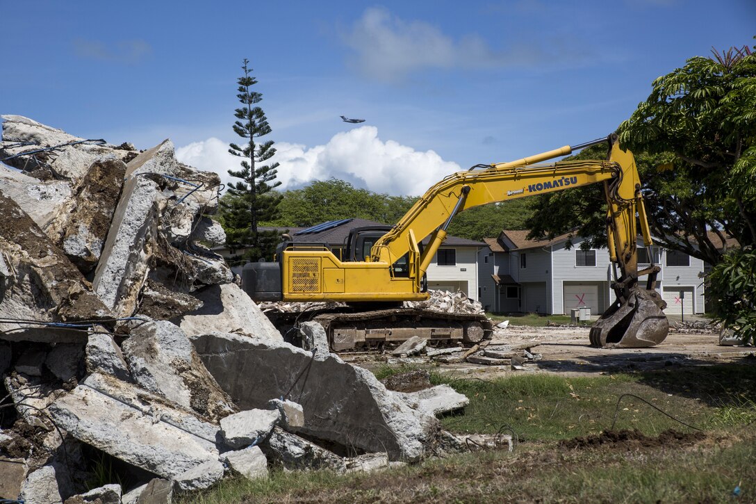MARINE CORPS BASE HAWAII – Reconstruction of the Hana Like neighborhood aboard Marine Corps Base Hawaii officially begins June 22, 2016 after a blessing and demolition ceremony.The ceremony was the official start of Phase 6, a multi-phased construction partnership where 276 homes will be torn down and rebuilt, which is part of the last major housing redevelopment on the Mokapu peninsula. The demolition site, workers and land were blessed by a Hawaiian minister, as per Hawaiian tradition for construction projects. This project will be the central community on the base, which will also include a pavilion, two large playgrounds and a basketball court. (U.S. Marine Corps Photo by Lance Cpl. Jesus Sepulveda Torres)