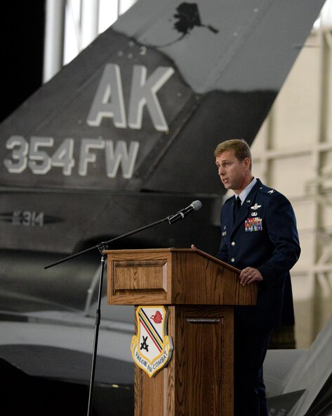 U.S. Air Force Col. David Mineau, the 354th Fighter Wing commander, gives a speech during the wing change of command ceremony, June 29, 2016, at Eielson Air Force Base, Alaska. Mineau said it will be the highest honor of his Air Force career to serve alongside the Icemen Team. (U.S. Air Force photo by Master Sgt. Karen J. Tomasik/Released)