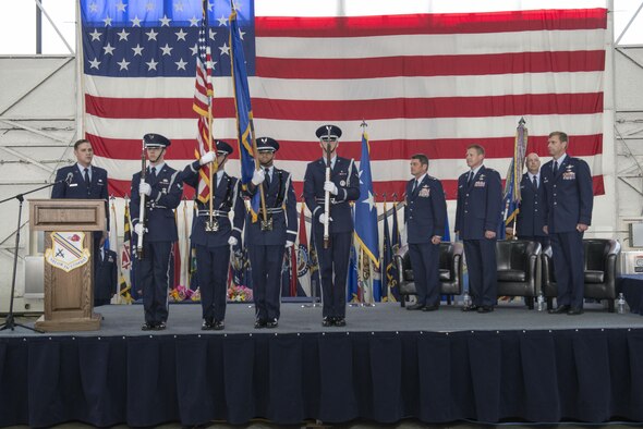 The Eielson base honor guard presents the colors for the National Anthem during the 354th Fighter Wing change of command ceremony, June 29, 2016, at Eielson Air Force Base. The Icemen Team gathered to welcome Col. David Mineau, the new 354th Fighter Wing commander, and say farewell to outgoing commander, Col. Michael Winkler. (U.S. Air Force photo by Staff Sgt. Ashley Nicole Taylor/Released)
